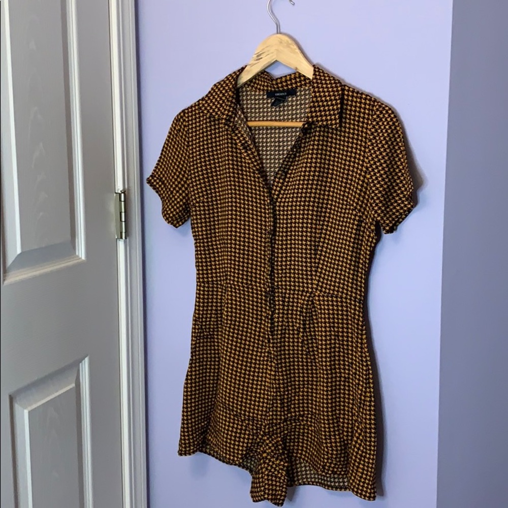 Romper black and orange houndstooth pattern